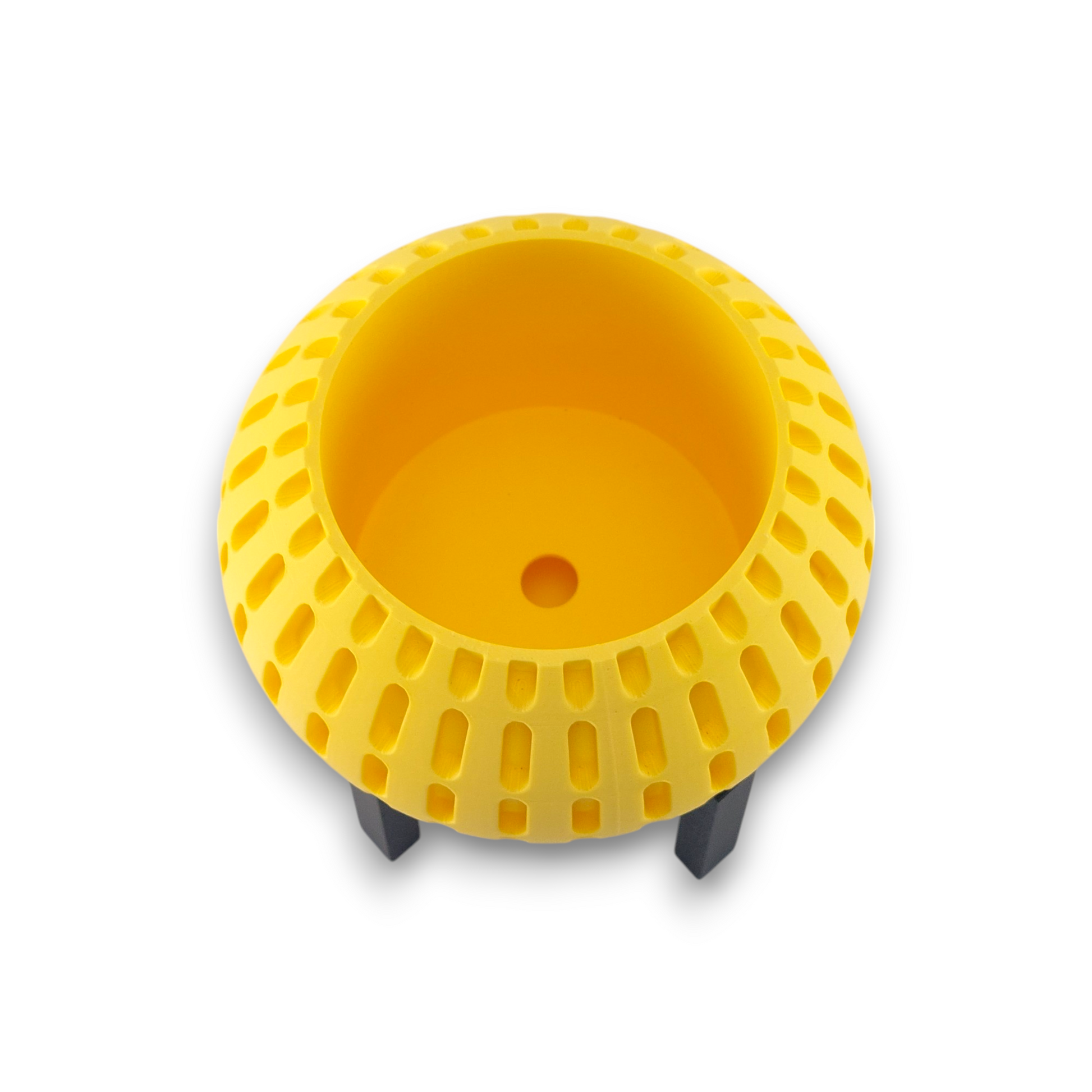 Yellow PLA planter – 3D printed with spherical body and evenly spaced vertical oval cutouts, mounted on black four-legged stand
