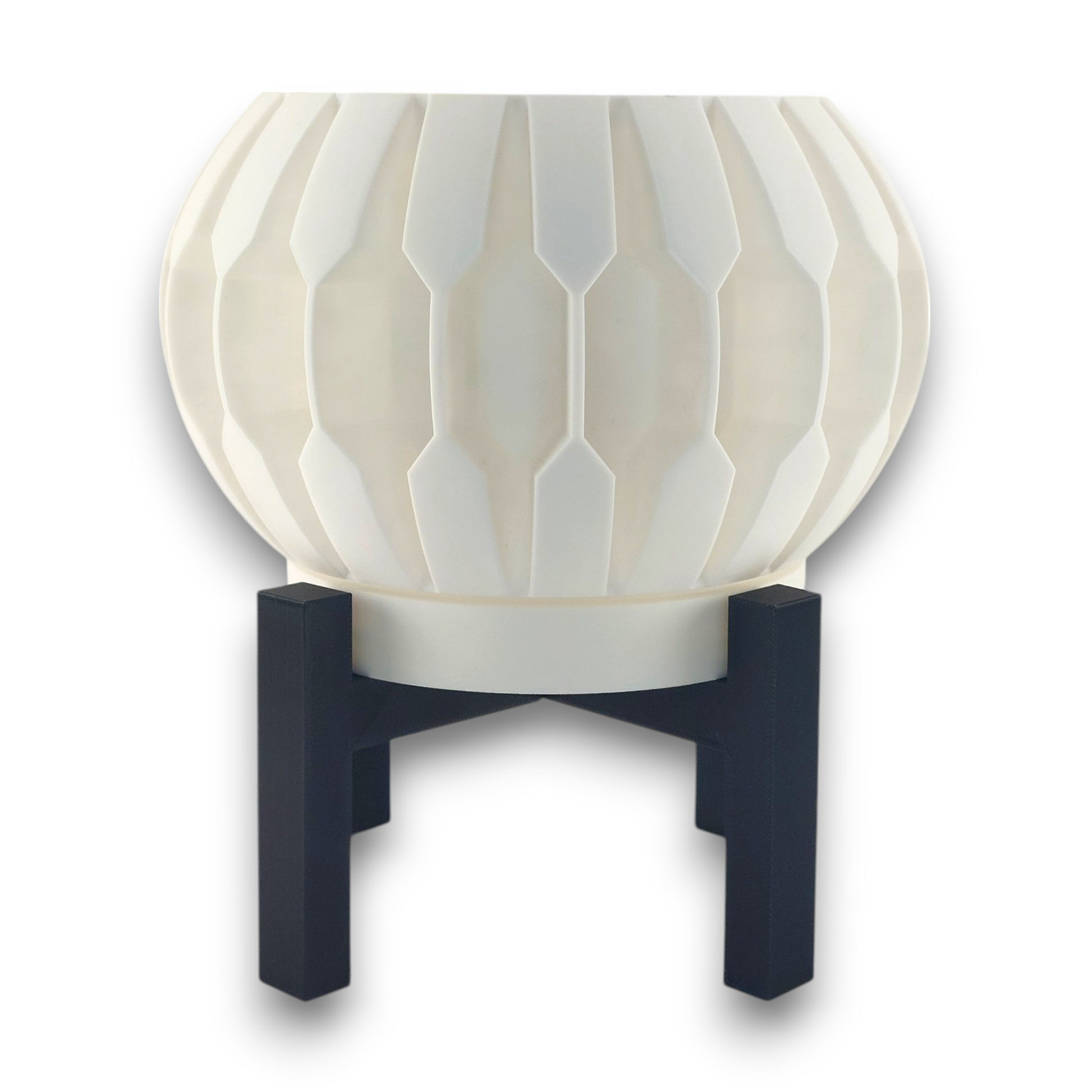 White PLA planter – 3D printed with spherical body and vertical blade-like ridges, mounted on black four-legged stand
