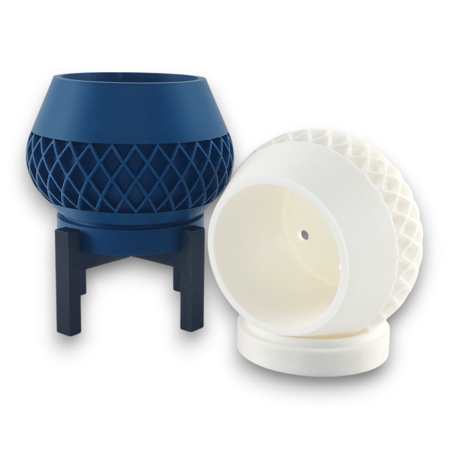 Blue and white PLA planters – 3D printed with bowl-shaped body and diamond lattice texture, elevated on black four-legged stand
