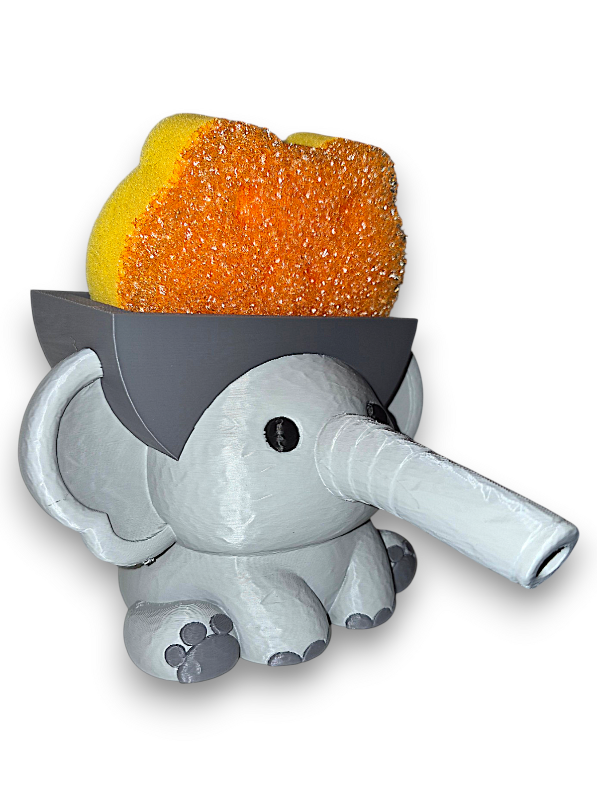 Gray 3D printed elephant sponge holder with a hollow trunk and flat top on a white background
