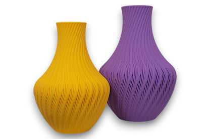 Purple and yellow PLA vases – 3D printed with spiral ridge texture and bulbous bases, shown side by side

