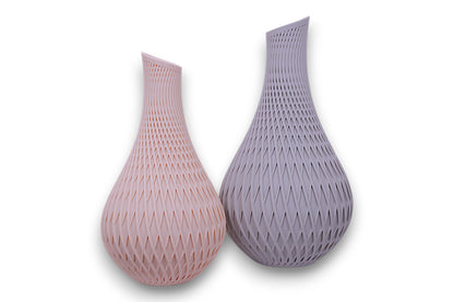 Light gray and beige PLA vases – 3D printed with diamond lattice texture and asymmetrical tops, shown side by side