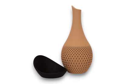 Brown textured vase with a black scoop on a white background