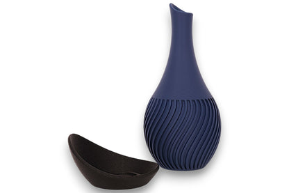 Dark blue PLA vase – 3D printed with ribbed lower half and narrow neck, shown beside matte black asymmetrical bowl
