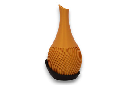 Gold PLA vase – 3D printed with spiral groove texture and flared neck, seated in black crescent-shaped base
