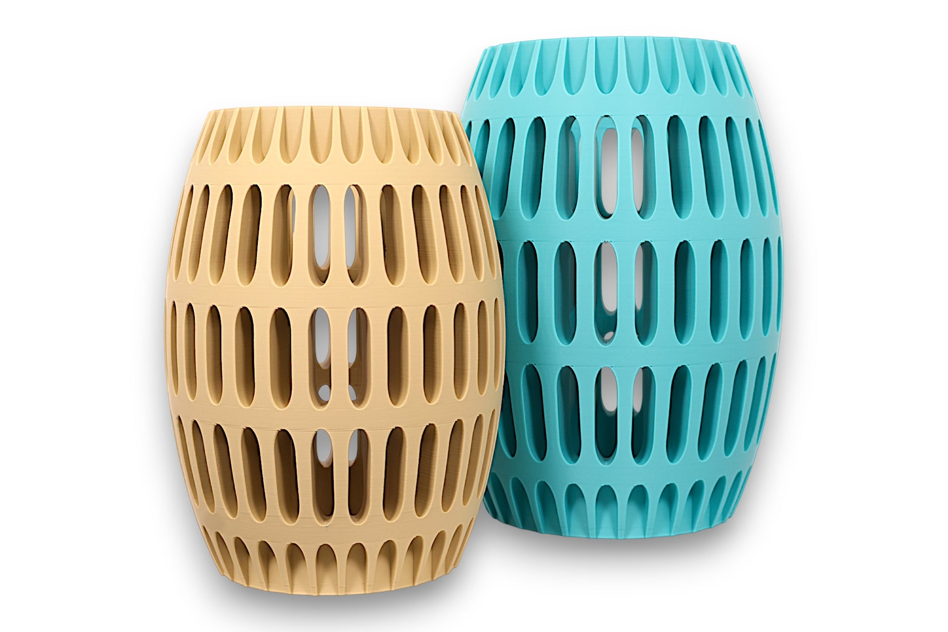 Tan and turquoise PLA vases – 3D printed with barrel-shaped bodies and vertical oval cutouts, displayed side by side
