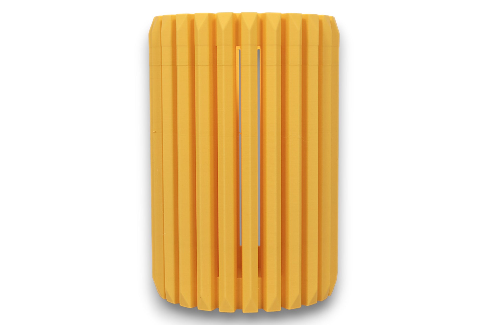 yellow cylindrical vase with ribbed texture on a white background