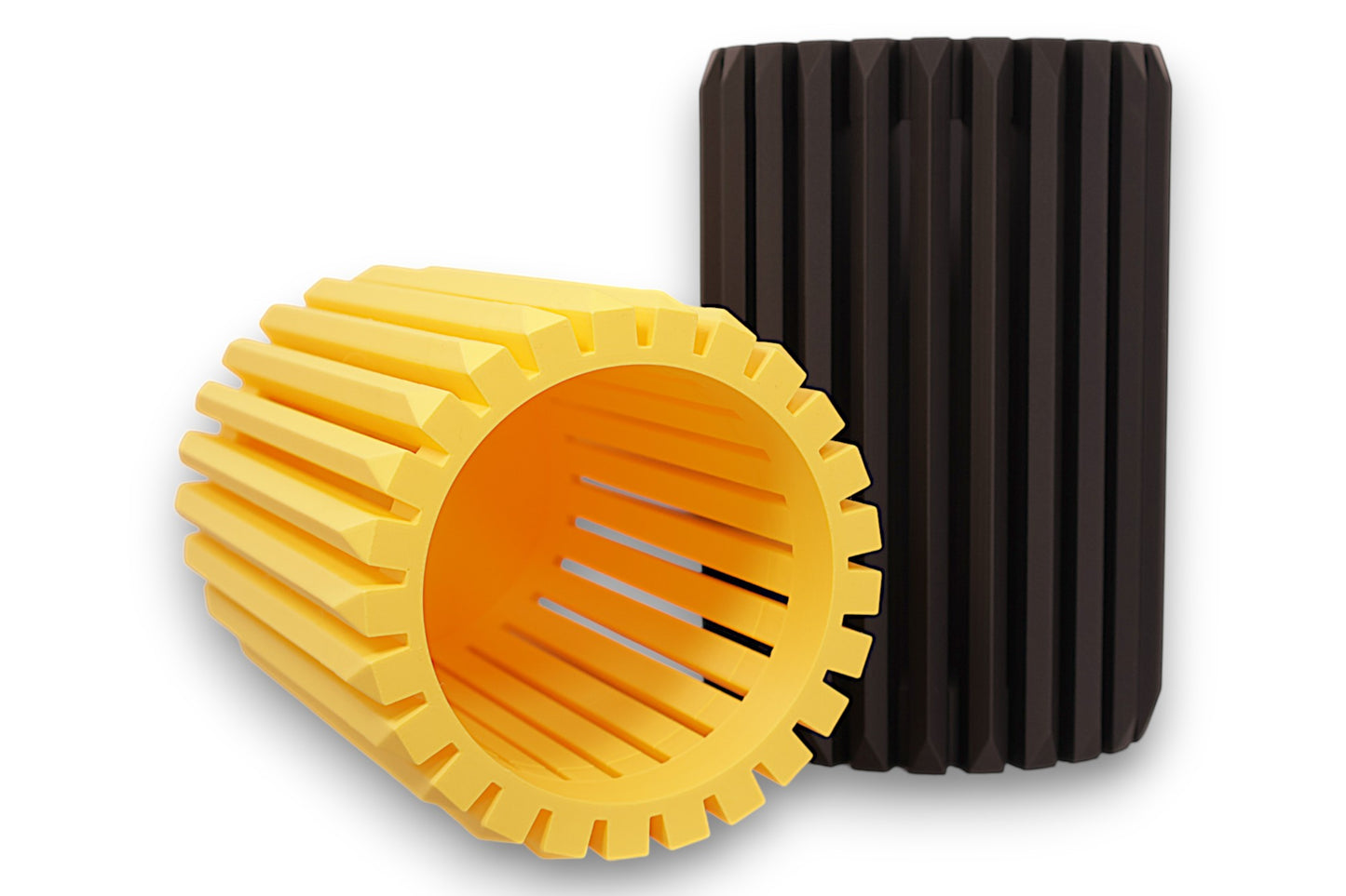 Yellow and black PLA vases – 3D printed with gear-like ridged surfaces and hollow centers, displayed upright
