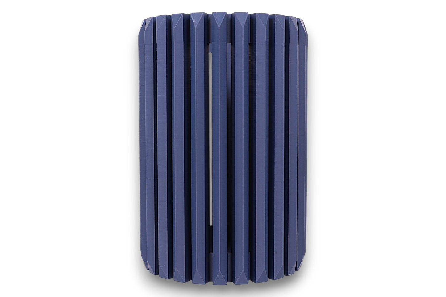 Blue cylindrical vase with ribbed texture on a white background