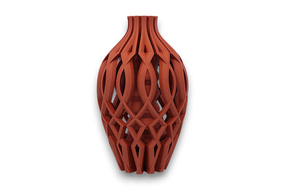 Red woven patterned vase on a white background