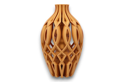 gold vase with intricate lattice design on a white background