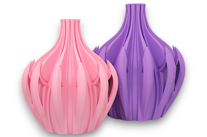 Pink and purple PLA vases – 3D printed with bulbous bases and vertical petal-like blades, displayed side by side
