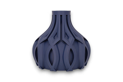 Dark blue PLA vase – 3D printed with bulbous base and interwoven lattice texture, tapering to narrow neck
