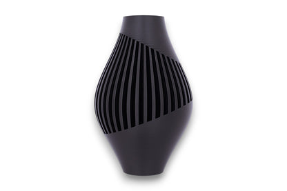 Black PLA vase – 3D printed with elongated body and angled vertical slits spiraling around the form, sculptural matte finish
