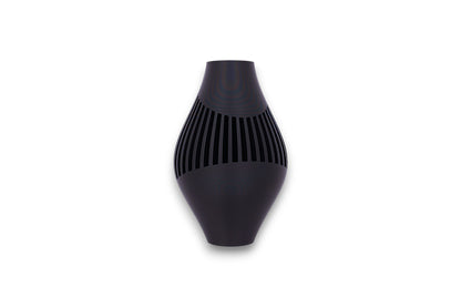 Black textured vase on a white background