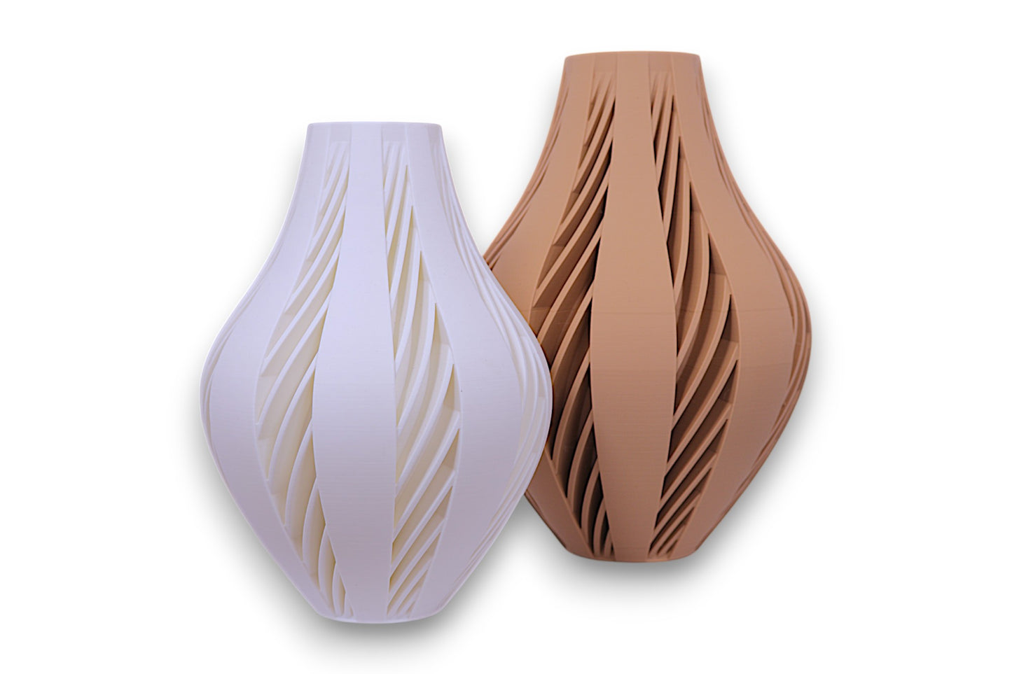White and brown PLA vases – 3D printed with elongated bodies and curved vertical cutouts, displayed side by side
