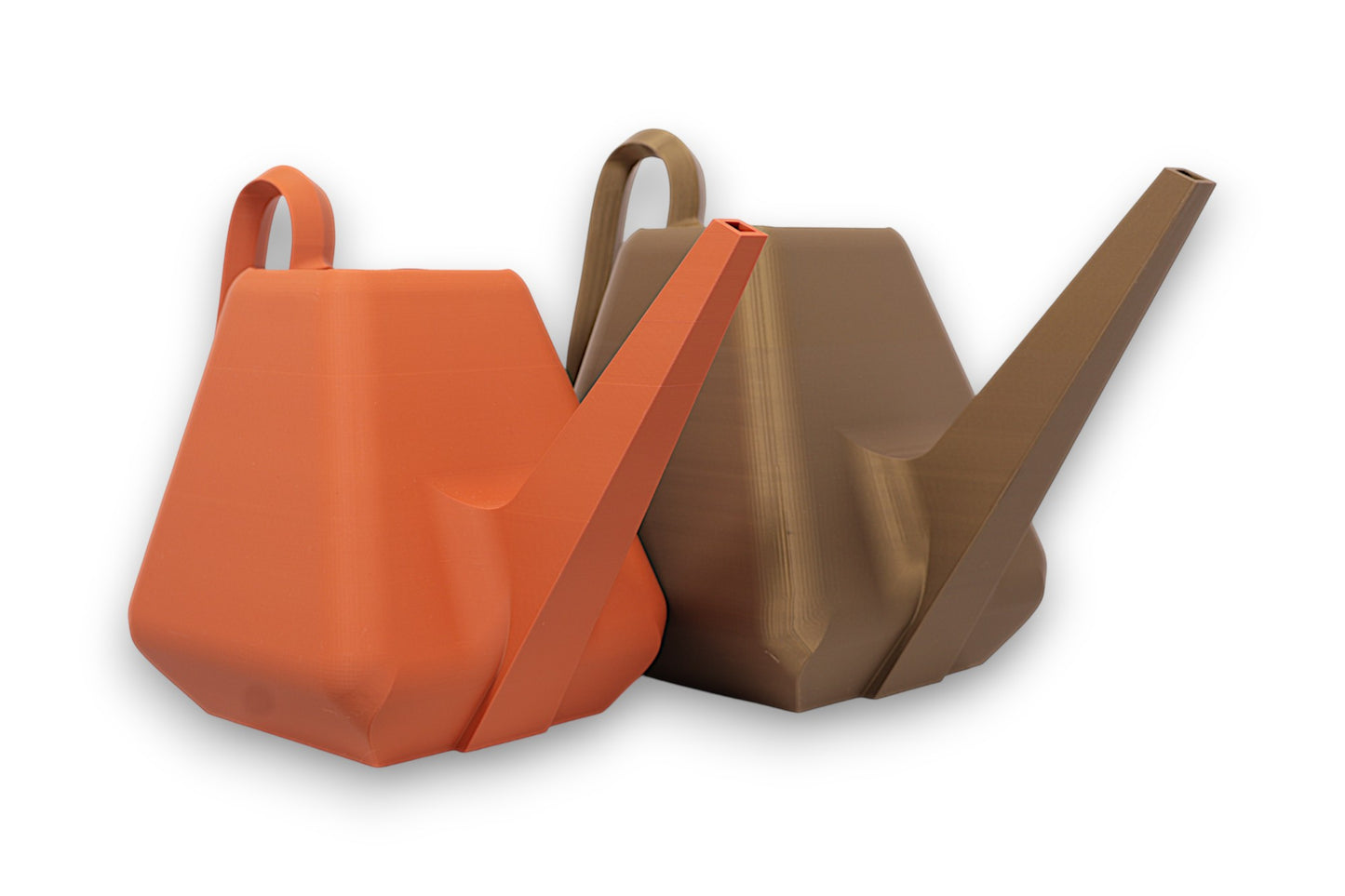 Terracotta, bronze, and tan PLA watering cans – 3D printed with angular sculptural bodies, elongated spouts, and integrated loop handles, arranged side by side on white background
