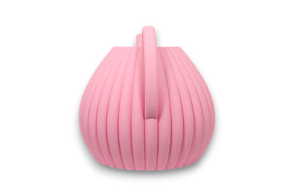 Pink PLA watering can – 3D printed with vertically ribbed body, arched handle, and angled spout
