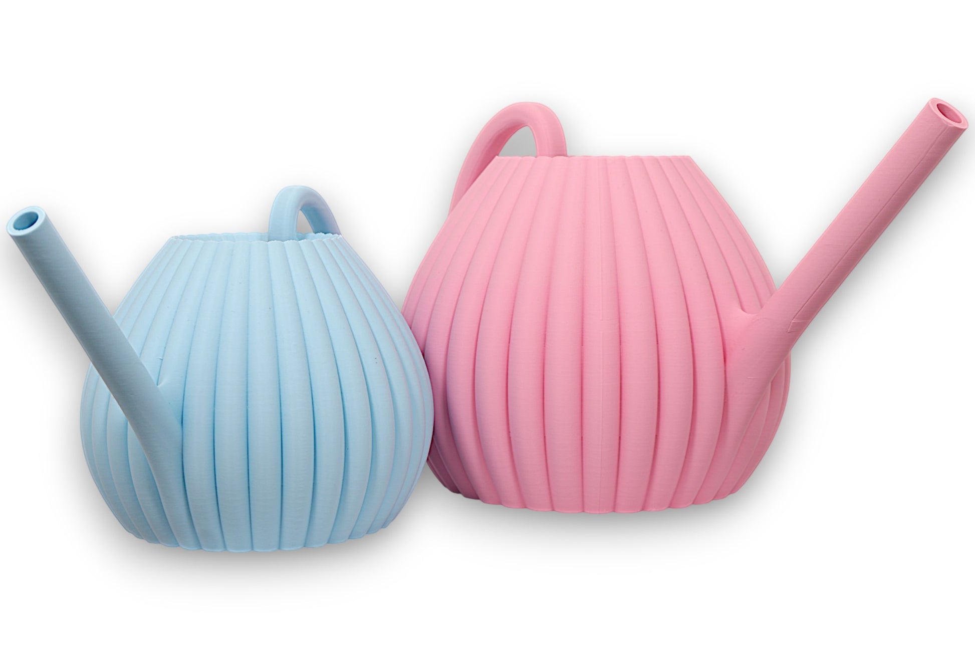 Light blue and pink PLA watering cans – 3D printed with ribbed bodies and angled spouts, shown side by side

