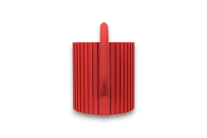 Red PLA watering can – 3D printed with vertically ribbed cylindrical body, slatted angled spout, and rounded loop handle
