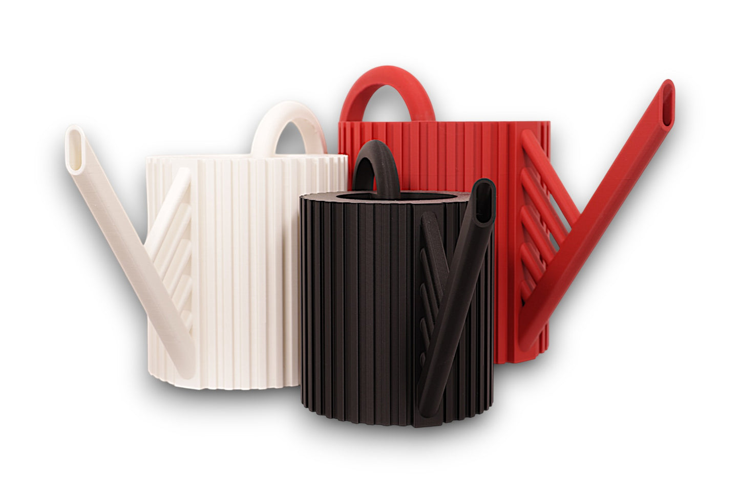 White, black, and red PLA watering cans – 3D printed with vertically ribbed cylindrical bodies and circular top handles, arranged in staggered layout

