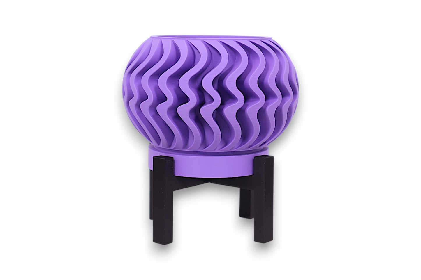 Purple PLA planter – 3D printed with spherical body and vertical wavy texture, elevated on black four-legged stand
