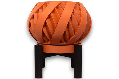 Terracotta PLA planter – 3D printed with interwoven ribbon texture and bulbous form, elevated on black four-legged stand
