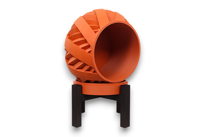 Terracotta PLA planter – 3D printed with interwoven ribbon texture and bulbous form, elevated on black four-legged stand
