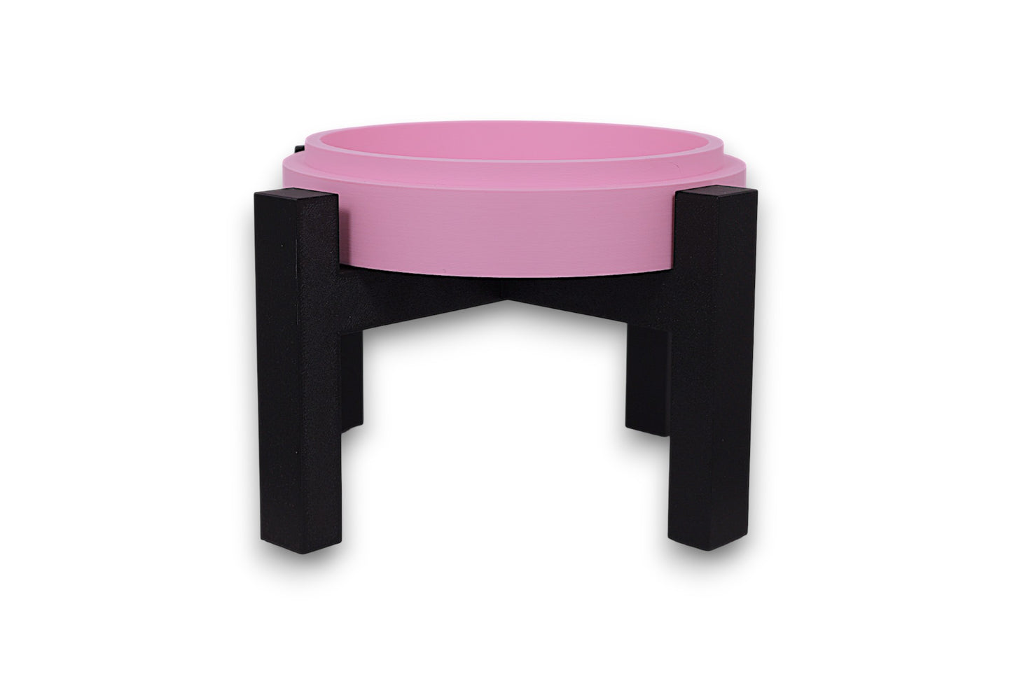 Pink drip tray with black legs on a white background