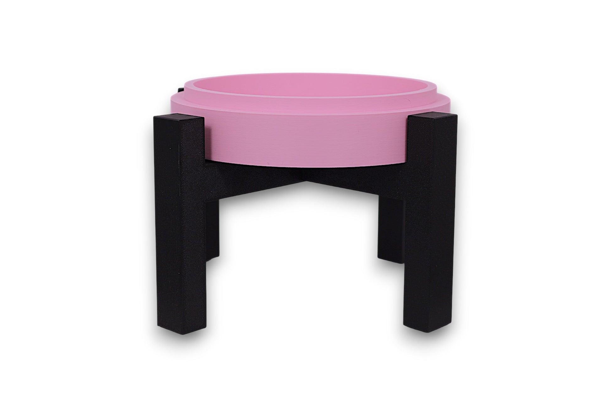 Pink drip tray with black legs on a white background