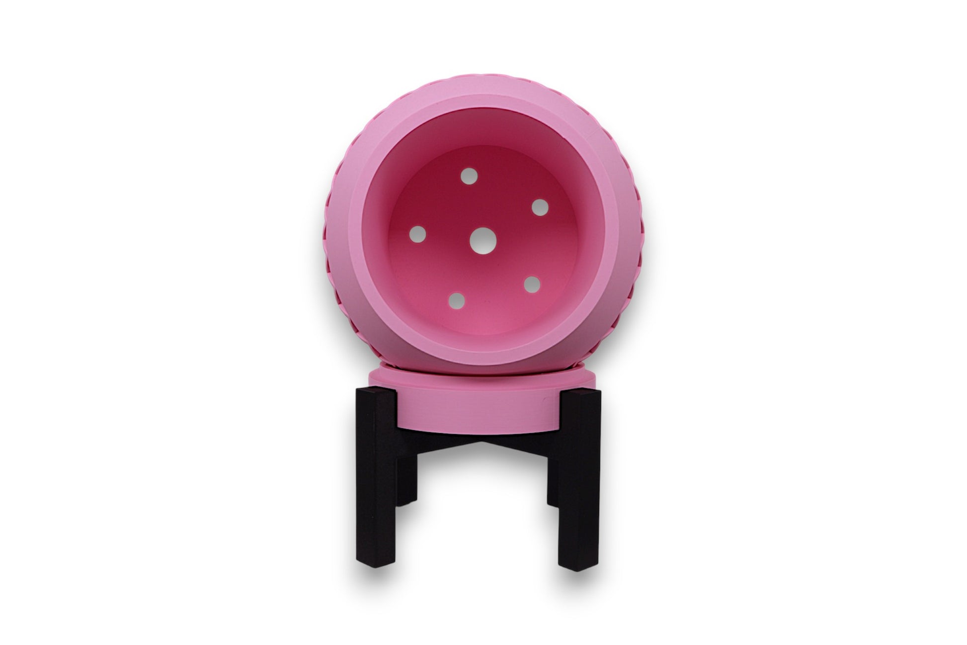 Pink PLA planter – 3D printed with bowl-shaped body and diamond lattice texture, mounted on black three-legged stand
