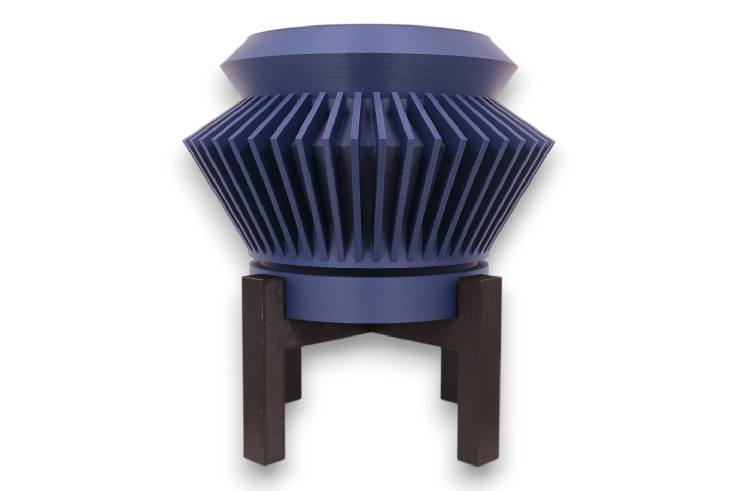 Blue PLA planter – 3D printed with radial fin texture and conical profile, elevated on black four-legged stand
