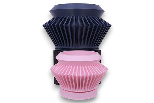 Blue and pink PLA planters – 3D printed with vertical fin textures and cylindrical forms, stacked in staggered layout
