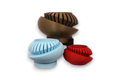 Bronze, light blue, and red PLA sculptures – 3D printed with interlocking spiral blade textures, displayed together on black stands in staggered heights

