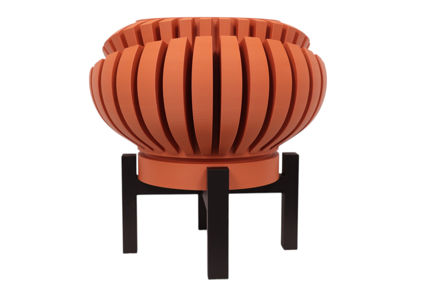 Terracotta PLA planter – 3D printed with curved slats forming a dynamic spiral sphere, mounted on black stand
