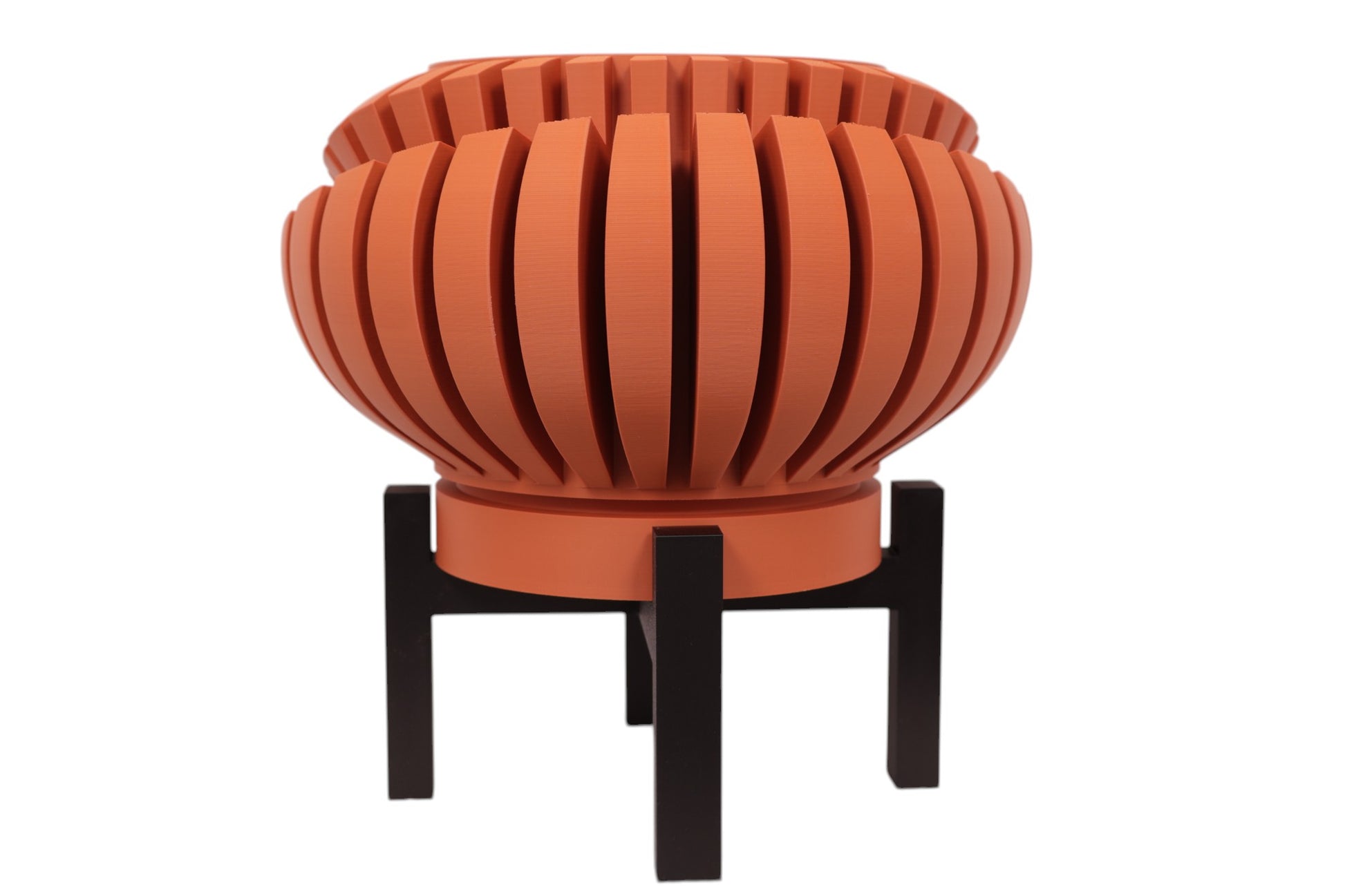 Terracotta PLA planter – 3D printed with curved slats forming a dynamic spiral sphere, mounted on black stand
