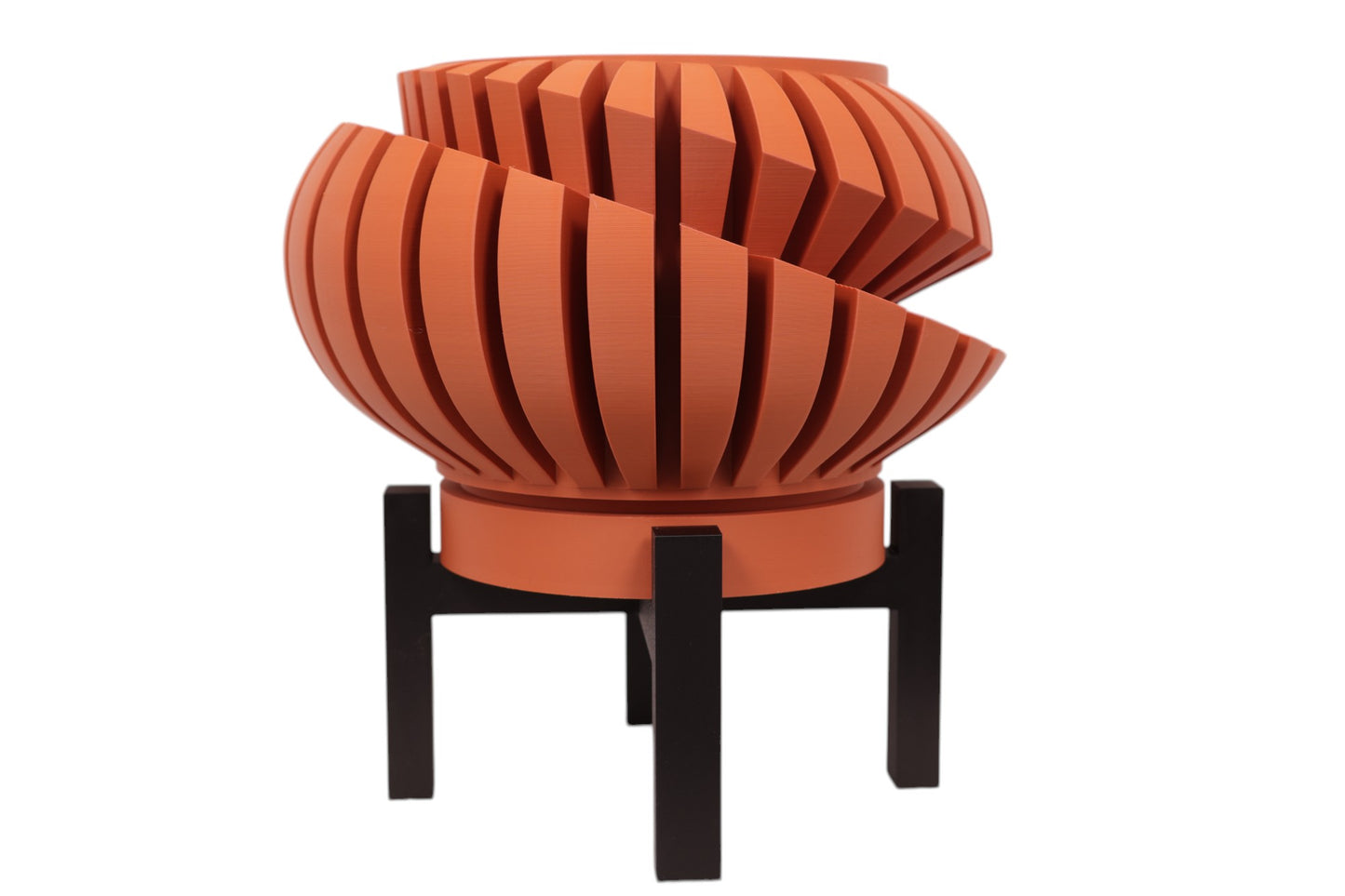Terracotta PLA planter – 3D printed with curved slats forming a dynamic spiral sphere, mounted on black stand
