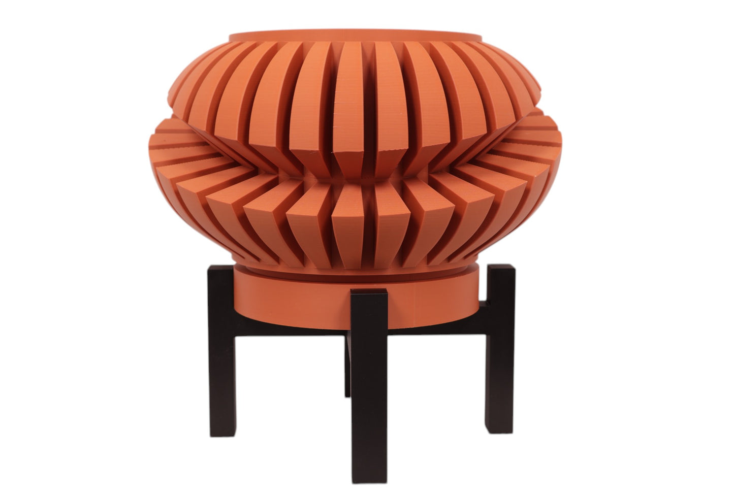 Terracotta PLA planter – 3D printed with curved slats forming a dynamic spiral sphere, mounted on black stand
