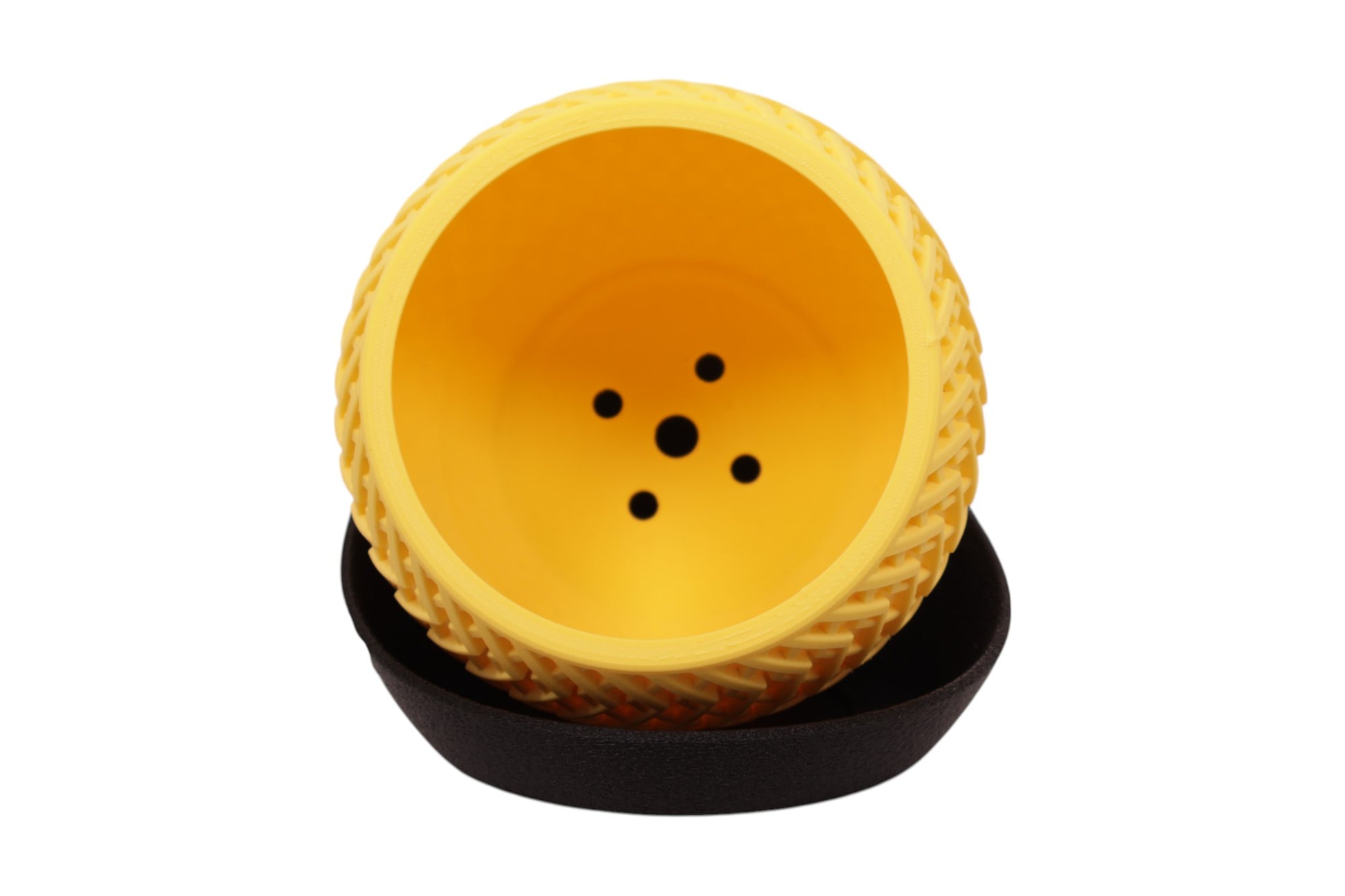 Yellow planter with black base on a white background