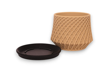 Tan PLA decorative container – 3D printed with spiral lattice texture, placed on dark smooth base
