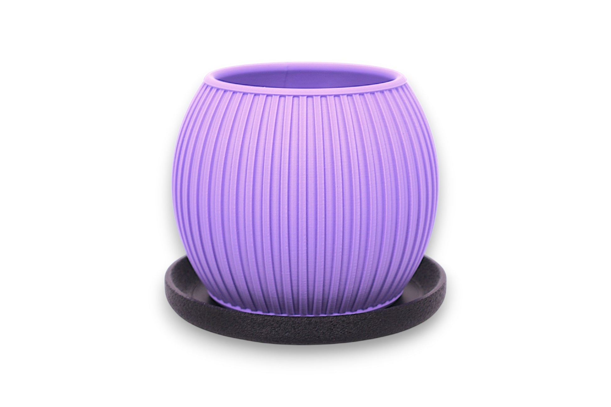 Purple PLA decorative planter – 3D printed with vertical ribbed texture and tapered shape, placed on black circular base
