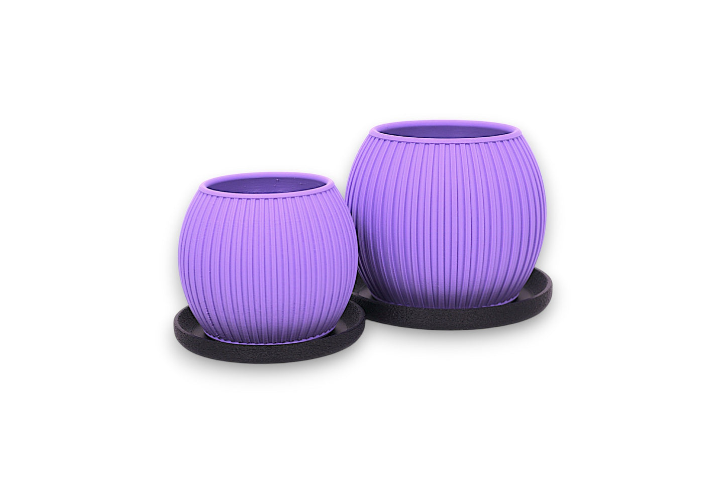 Set of two purple PLA decorative planters – 3D printed with vertical ribbed texture, displayed on black circular bases in staggered sizes
