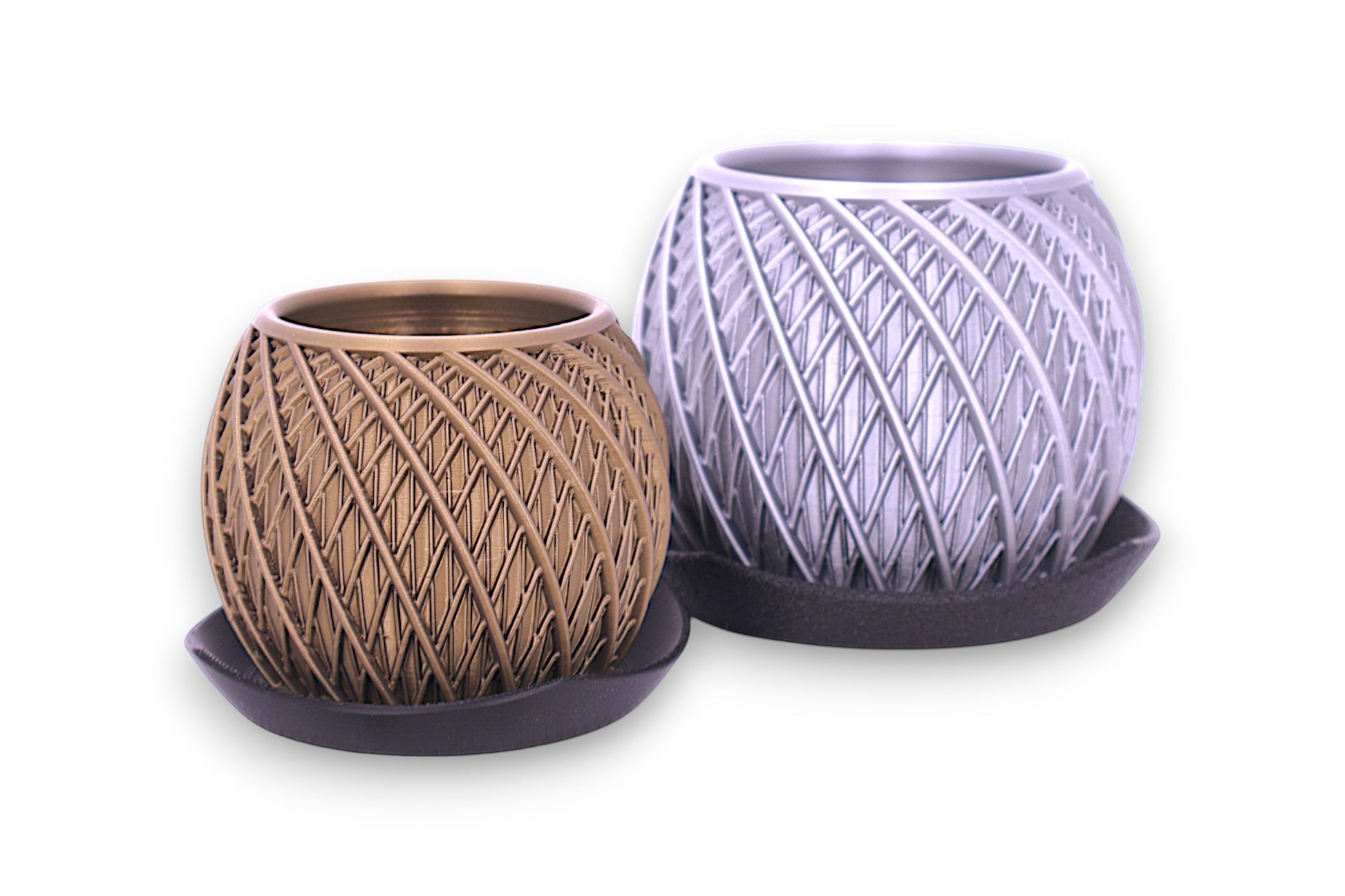 Bronze and silver PLA planters – 3D printed with spiral interwoven texture, each displayed on dark matching tray
