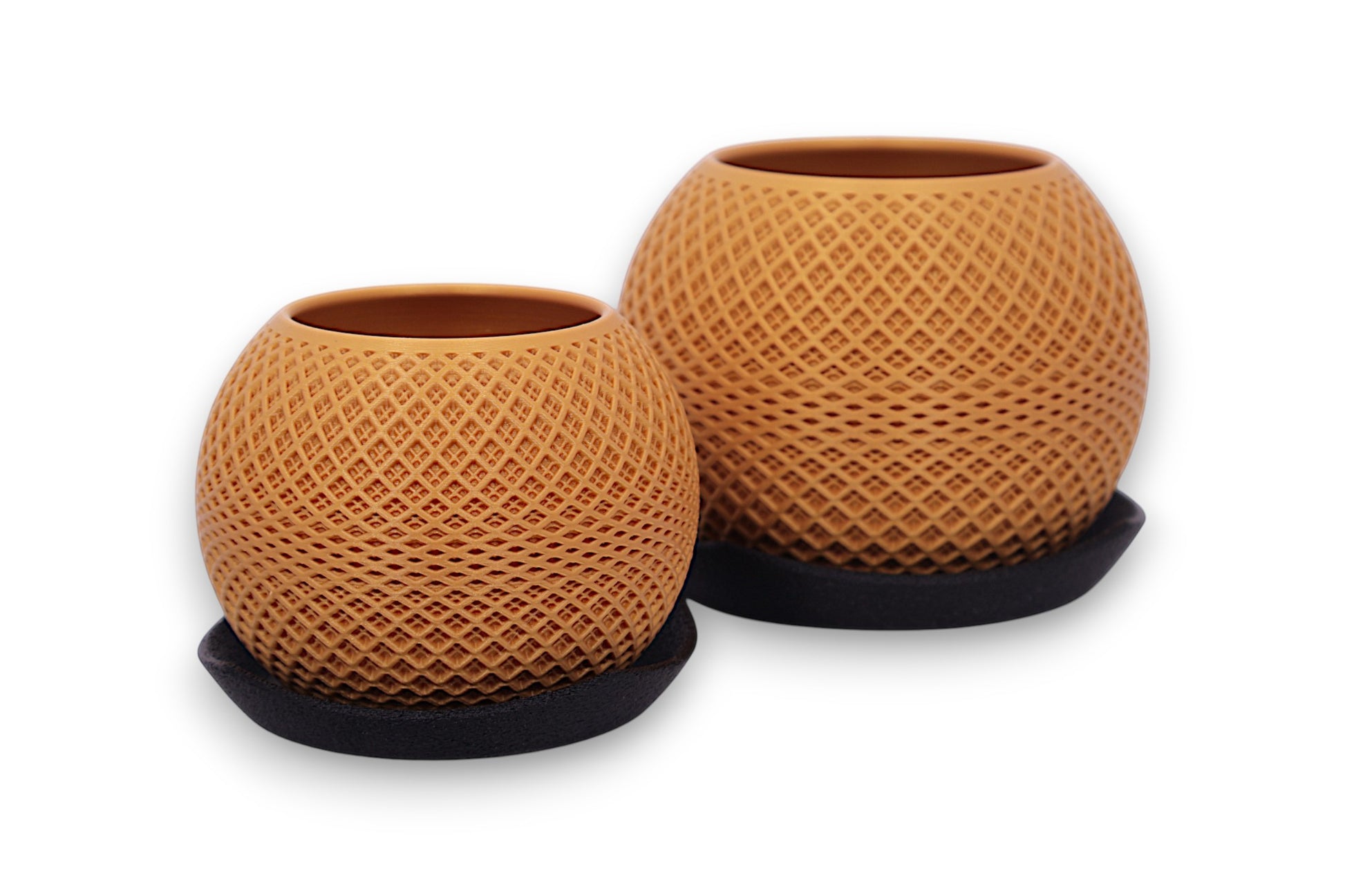 Set of two gold PLA planters – 3D printed with lattice texture, placed on black circular bases in staggered sizes
