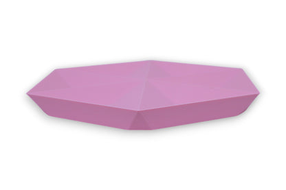 Pink faceted catch-all tray with hexagonal base and tapered sides