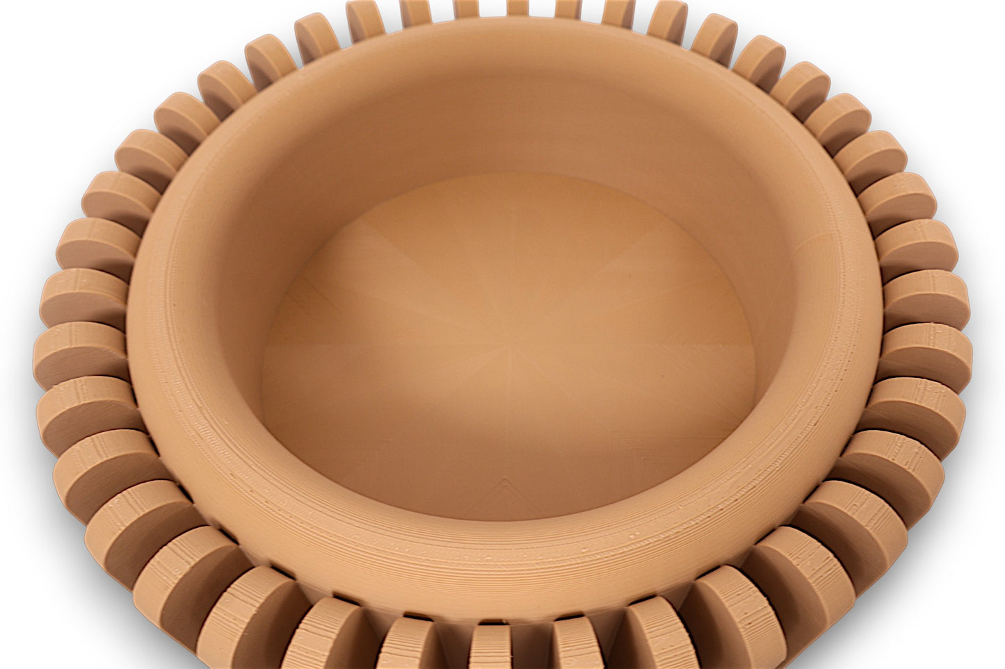 catch-all tray with radial triangular segments and slatted outer rim