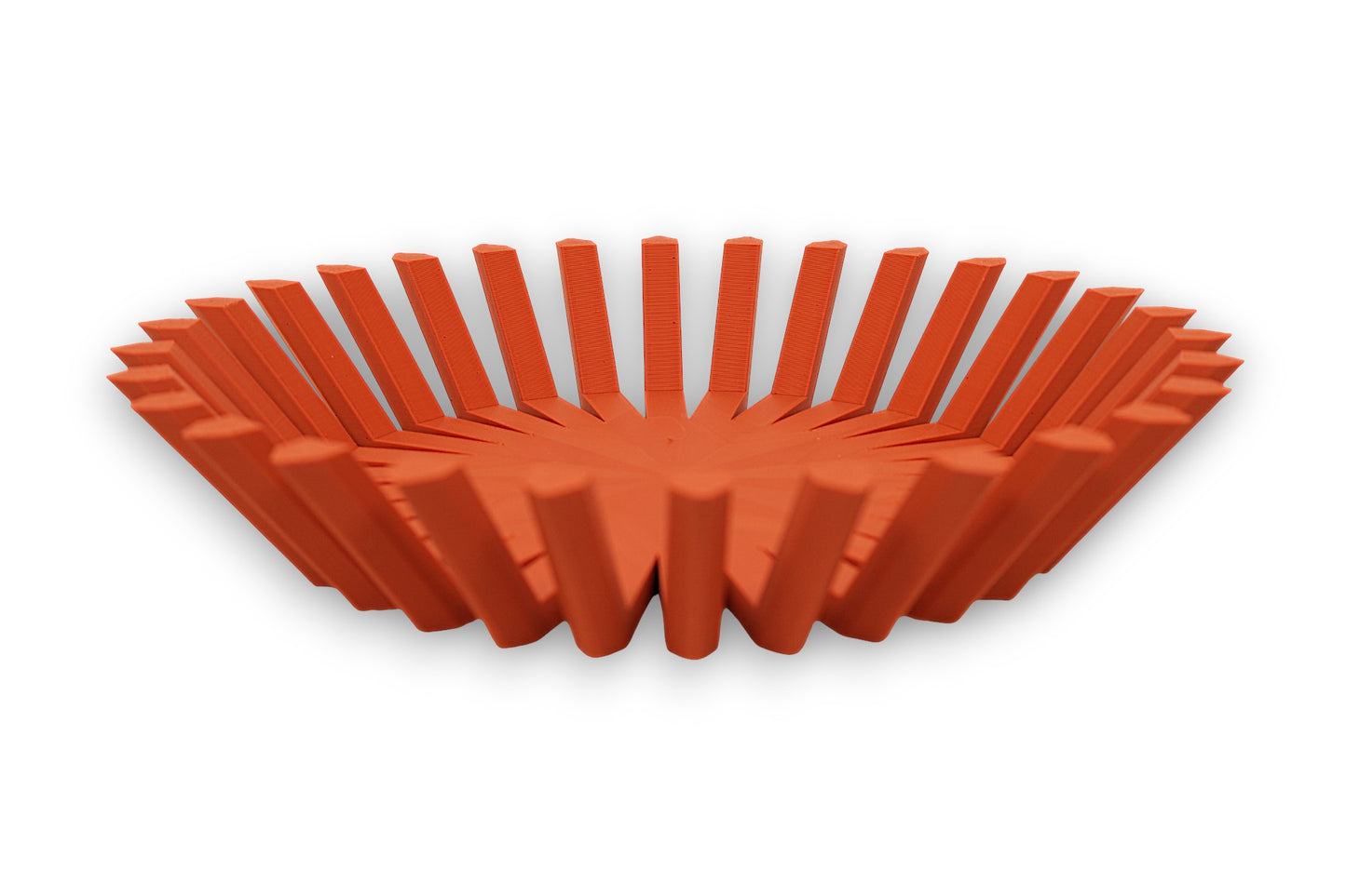 Terra cotta catch-all tray with angled rectangular prongs and faceted center base