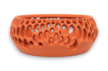 Terracotta catch-all tray with cellular-style holes and solid lower base