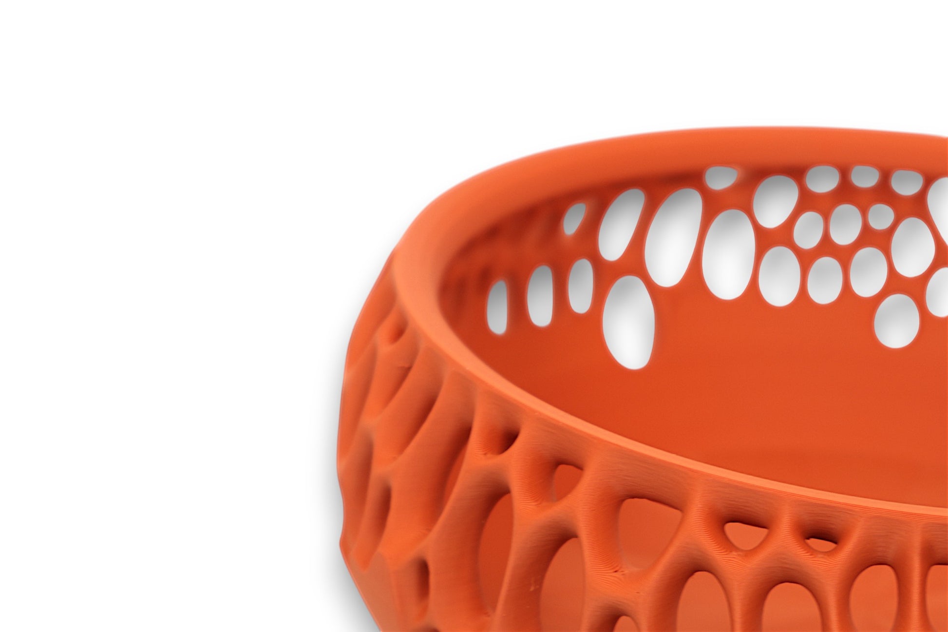 Terracotta catch-all tray with biomorphic mesh design and oval rim cutouts