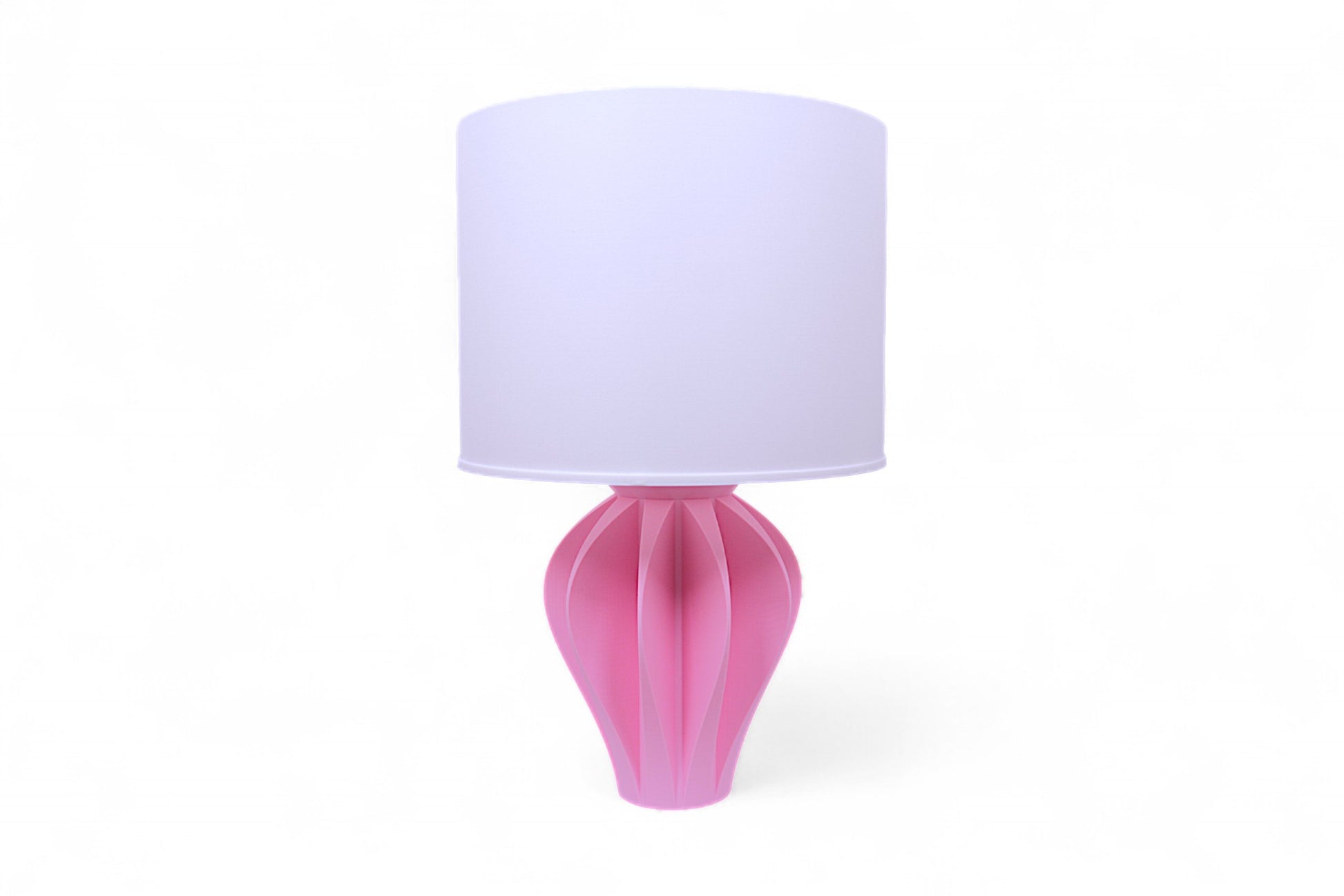Table lamp – white pleated lampshade with sculptural pink petal-like base, shown against white background
